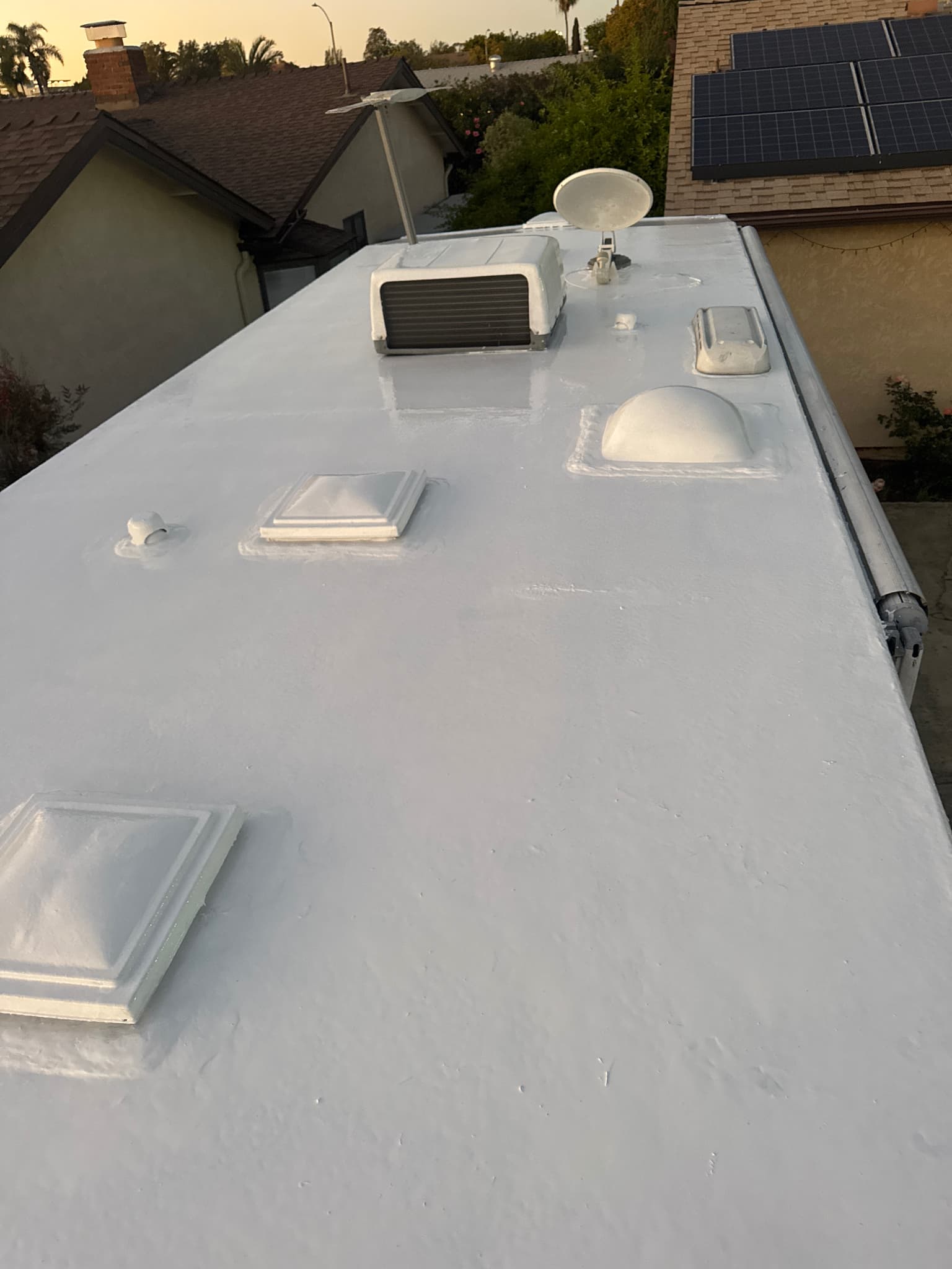 RV roof after silicone coating system application in San Diego