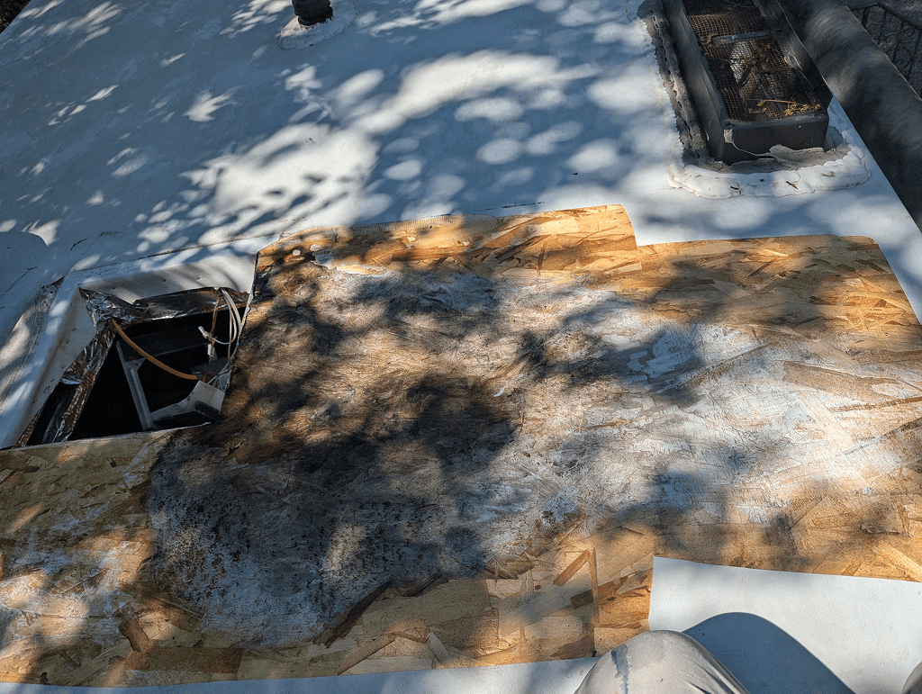 Rotten OSB roof damage exposed