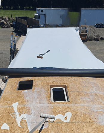 TPO membrane installation in progress