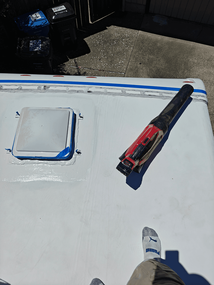 Washed roof taped before coating