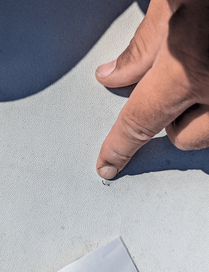 Small hole in RV roof membrane