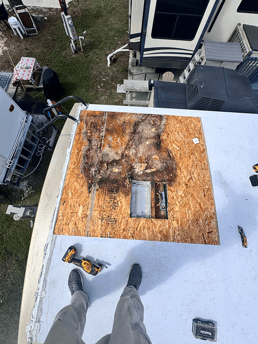 Rotten OSB exposed on RV roof after membrane removal