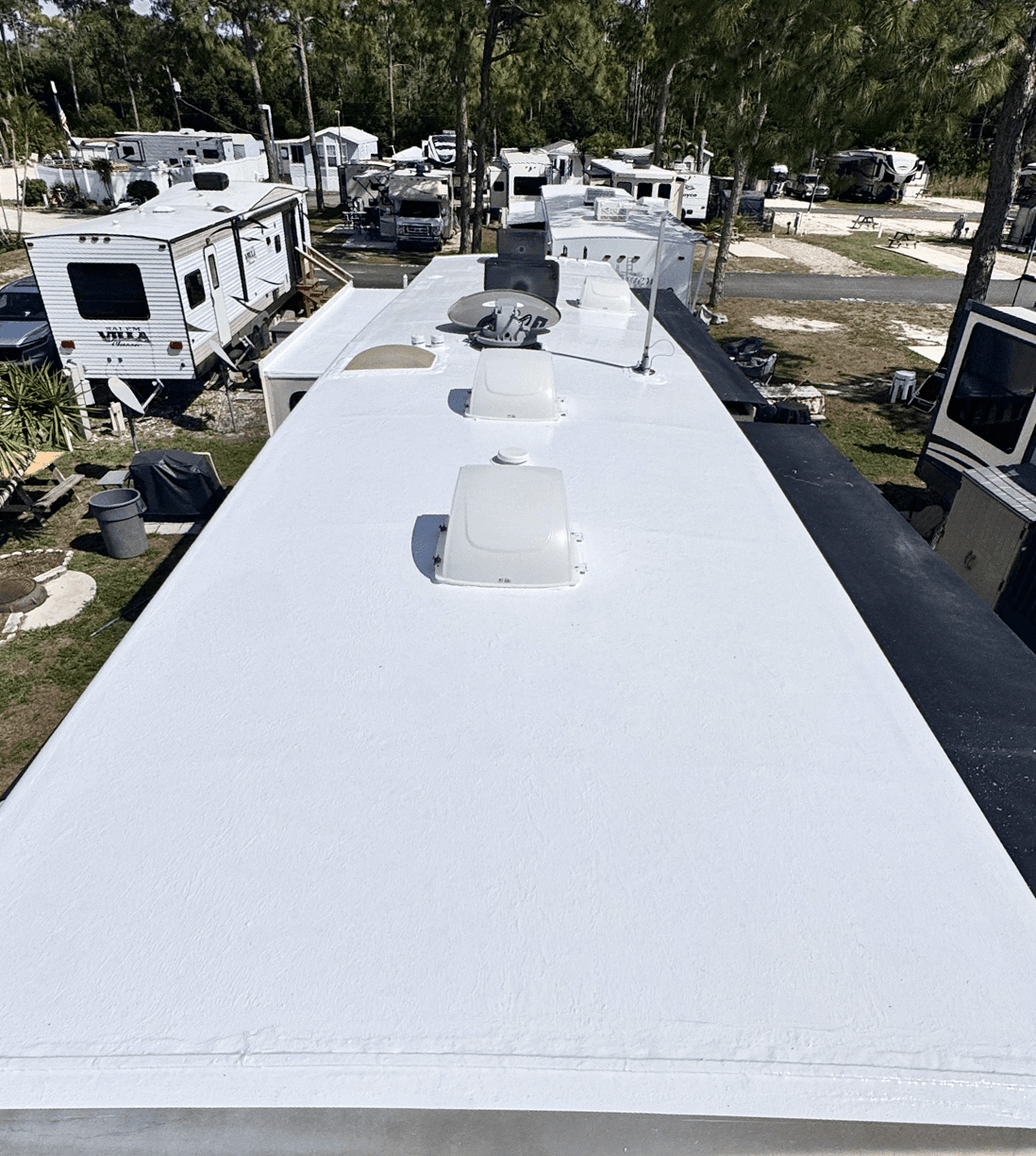 Finished RV roof with silicone coating system after repair