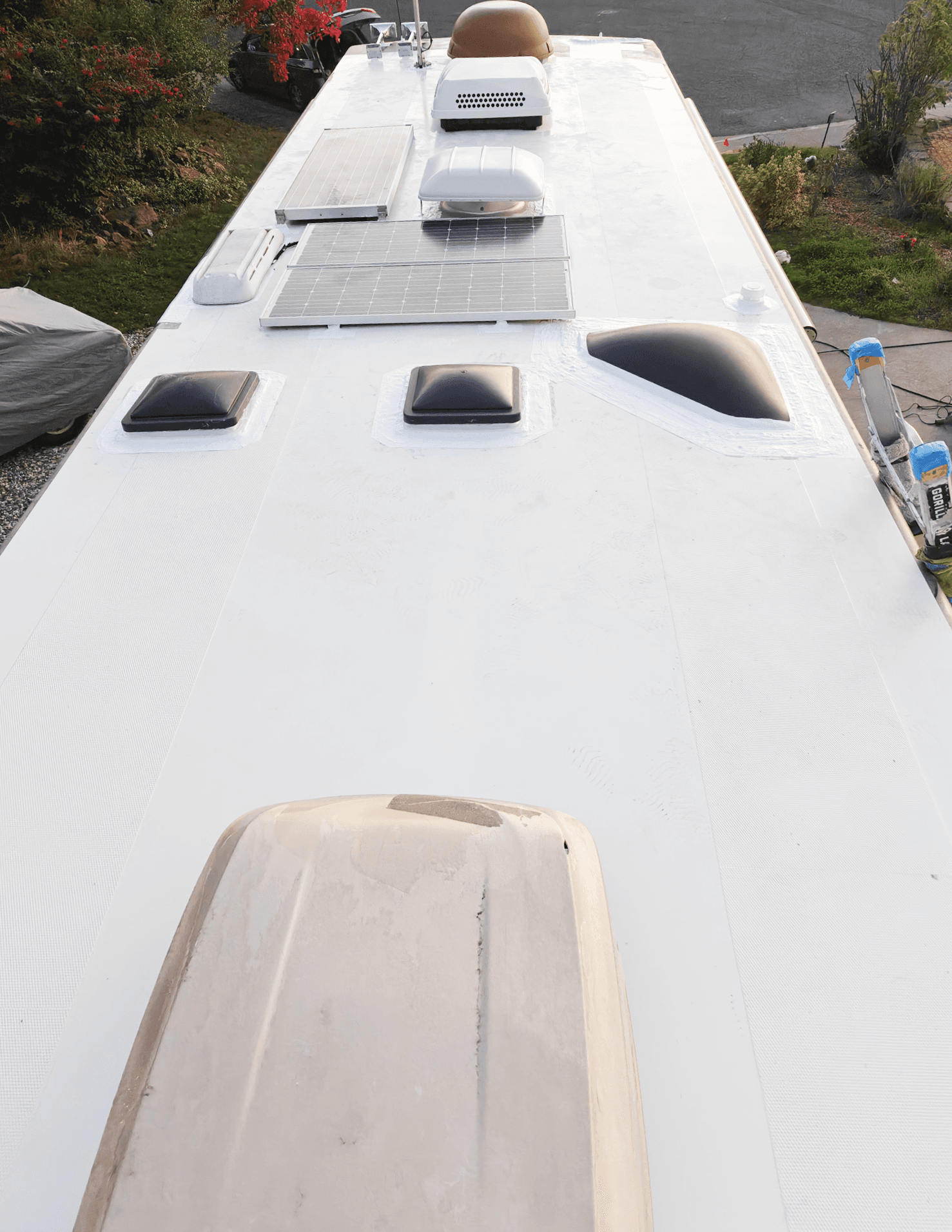 RV roof after maintenance with sealed seams and protected surface